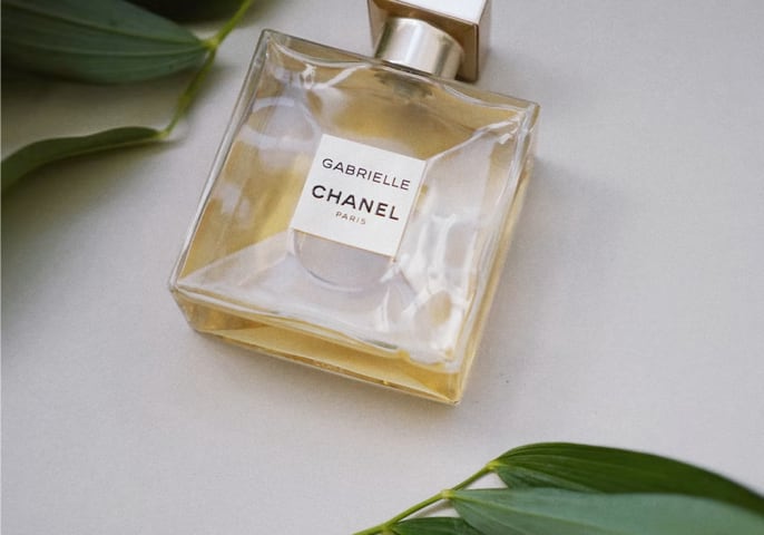 gabrielle chanel perfume and 2 leafs